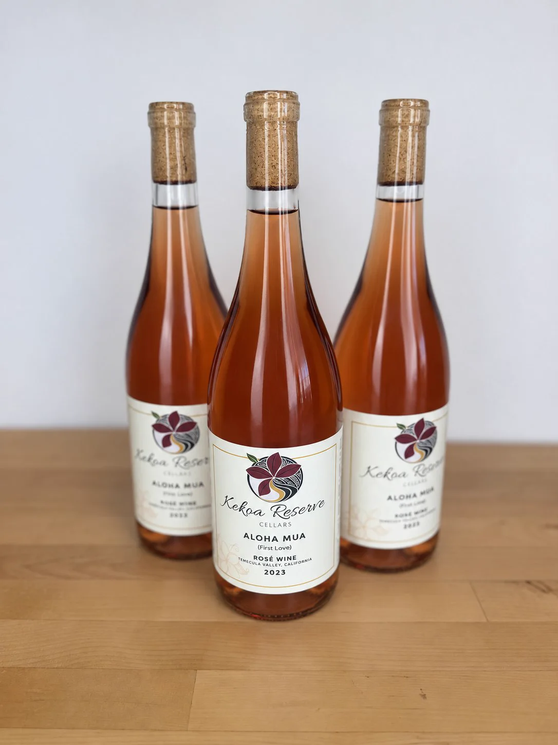 Three bottles of Aloha Mua Rosé 2023